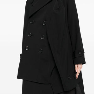 Comme Des Garcons Complete with asymmetrical sleeves