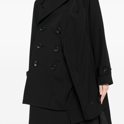 Comme Des Garcons Complete with asymmetrical sleeves