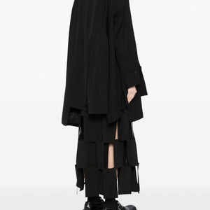Comme Des Garcons Complete with asymmetrical sleeves