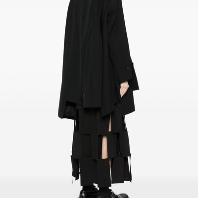 Comme Des Garcons Complete with asymmetrical sleeves