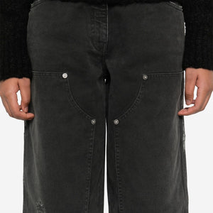 Golden Goose jeans with distressed effect and front patches