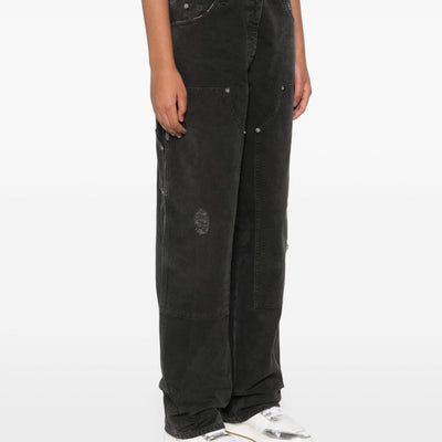 Golden Goose jeans with distressed effect and front patches