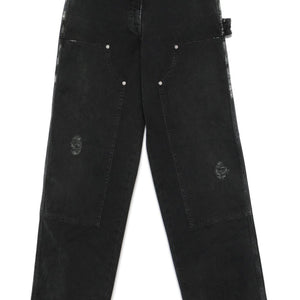 Golden Goose jeans with distressed effect and front patches