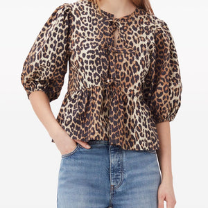 Ganni Conscious Criteria page Organic cotton peplum top