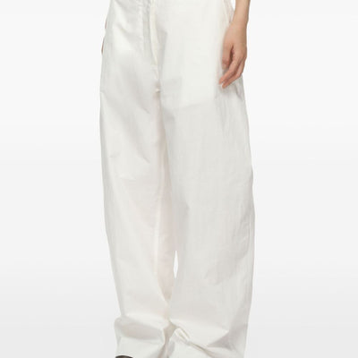 Studio Nicholson Round leg cotton trousers