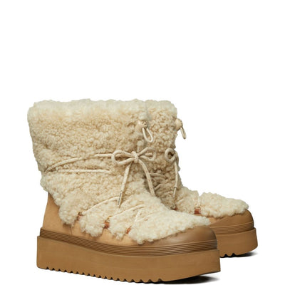 Tory Burch Mellow Shearling Platform Boots.