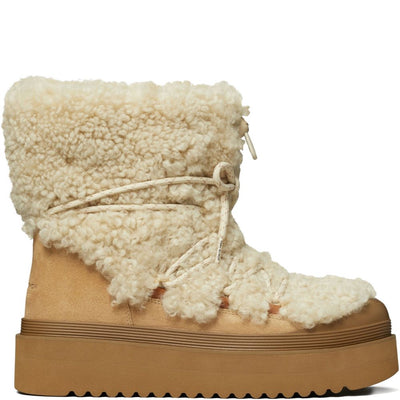 Tory Burch Mellow Shearling Platform Boots.