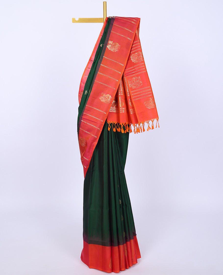 Green soft silk saree with zari buttas, contrast border of peacocks & pallu of kathir,neli,mayil & butta enclosed checks