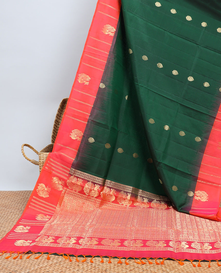 Green soft silk saree with zari buttas, contrast border of peacocks & pallu of kathir,neli,mayil & butta enclosed checks