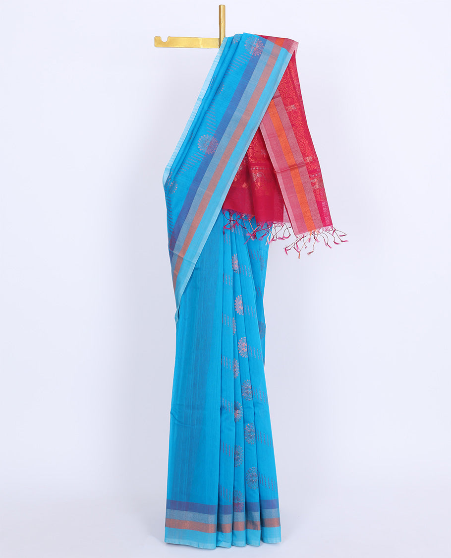 Blue silk cotton saree with buttas, contrast striped border & pallu of floral designs