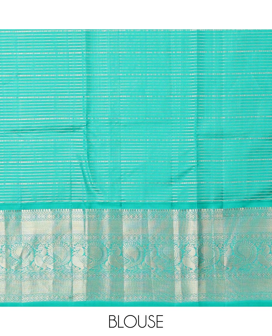 Cream striped silk saree with contrast border of thilakam mokku, mayil kann, mayil design & intricate zari design pallu