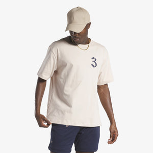 Reebok | LNY T-SHIRT  { SOFT ECRU