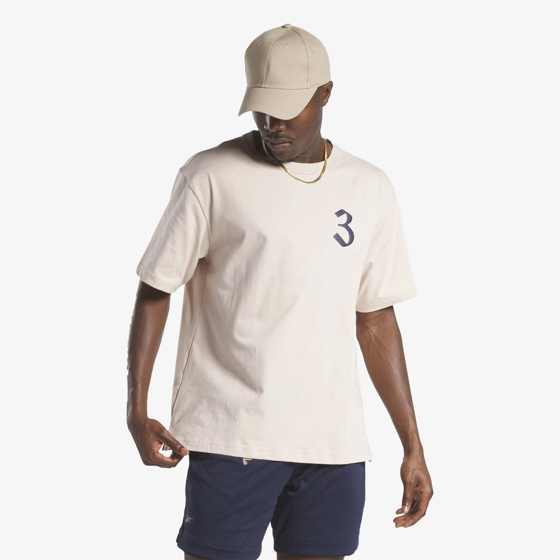 Reebok | LNY T-SHIRT  { SOFT ECRU