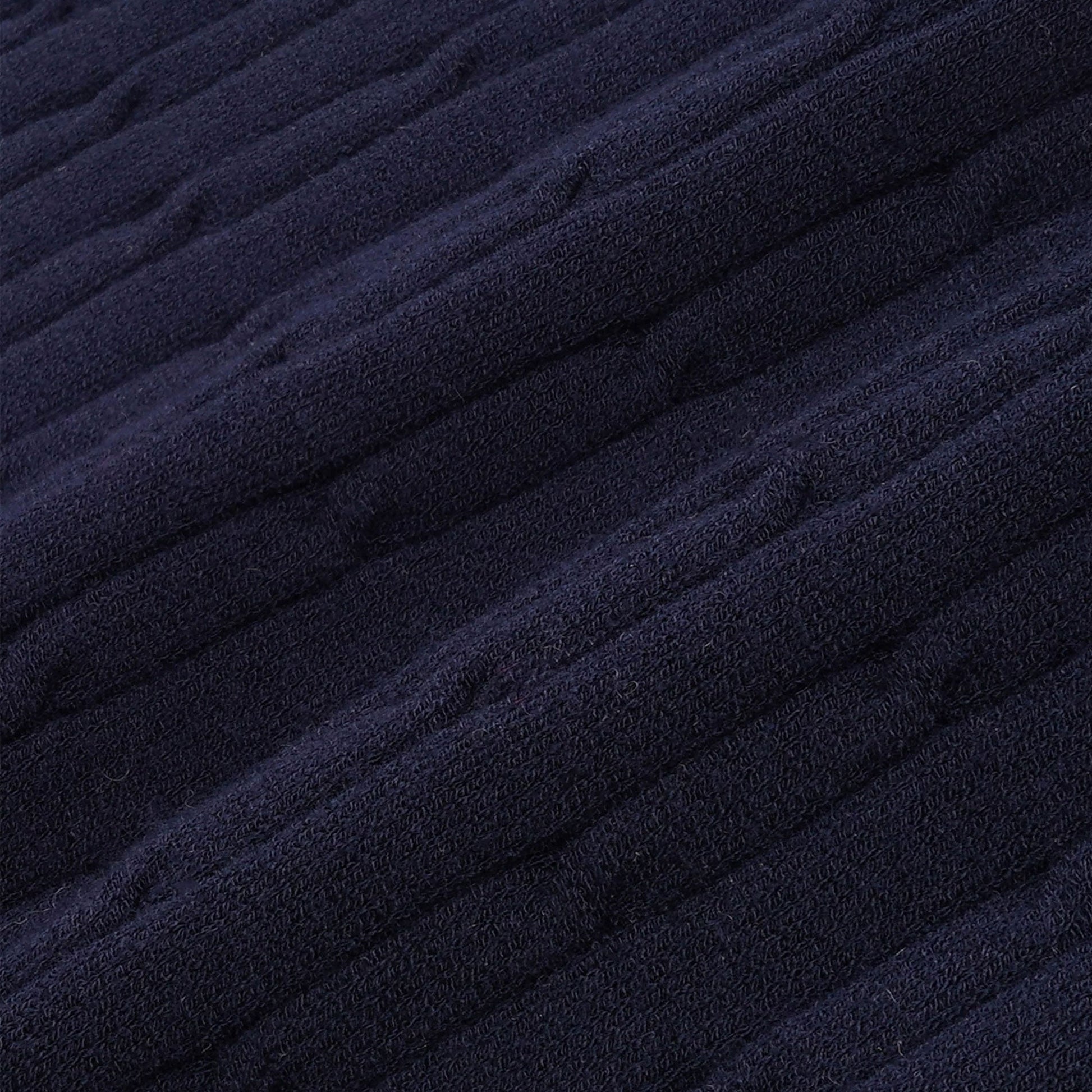 SPORTY & RICH | SERIF LOGO MINI CABLE SKIRT { NAVY