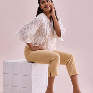 Women Solid Light Gold Mid Rise Cropped Metallic Pants