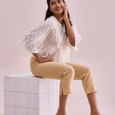 Women Solid Light Gold Mid Rise Cropped Metallic Pants