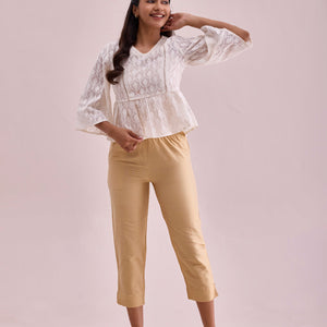 Women Solid Light Gold Mid Rise Cropped Metallic Pants