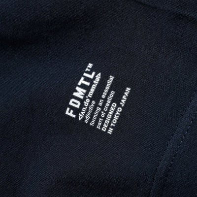 FDMTL | CIRCLE PATCH TEE { NAVY