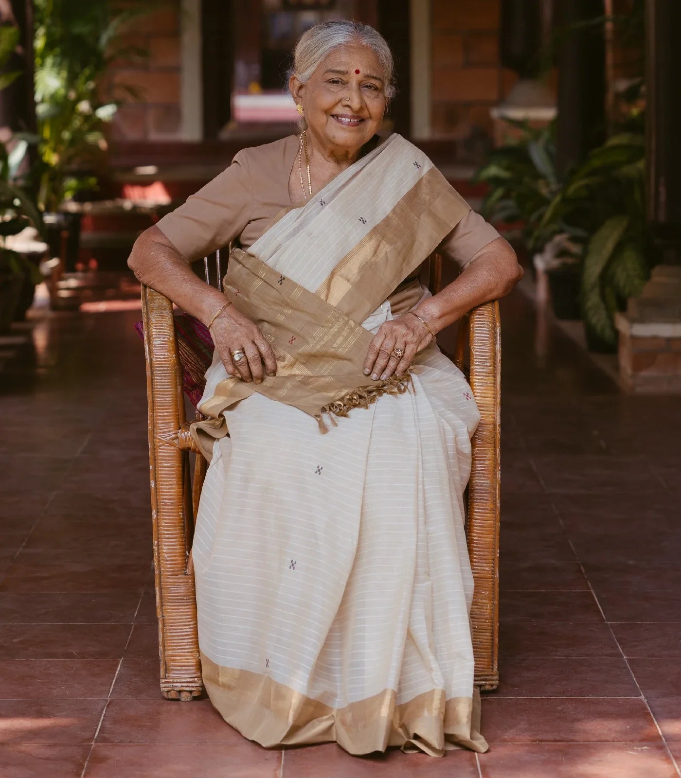 White Handloom Village Cotton Saree With Cross buttas in Red and Black