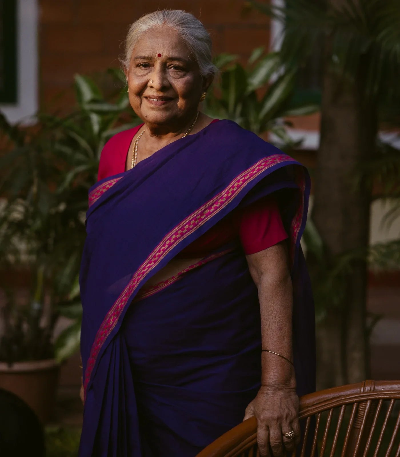 Violet Handloom Venkatagiri Cotton Saree With Border in a checkered pattern
