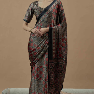 Brown Ajrakh Printed Satin Saree With Tassels