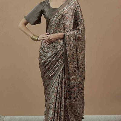 Brown Floral Ajrakh Printed Satin Saree With Tassels