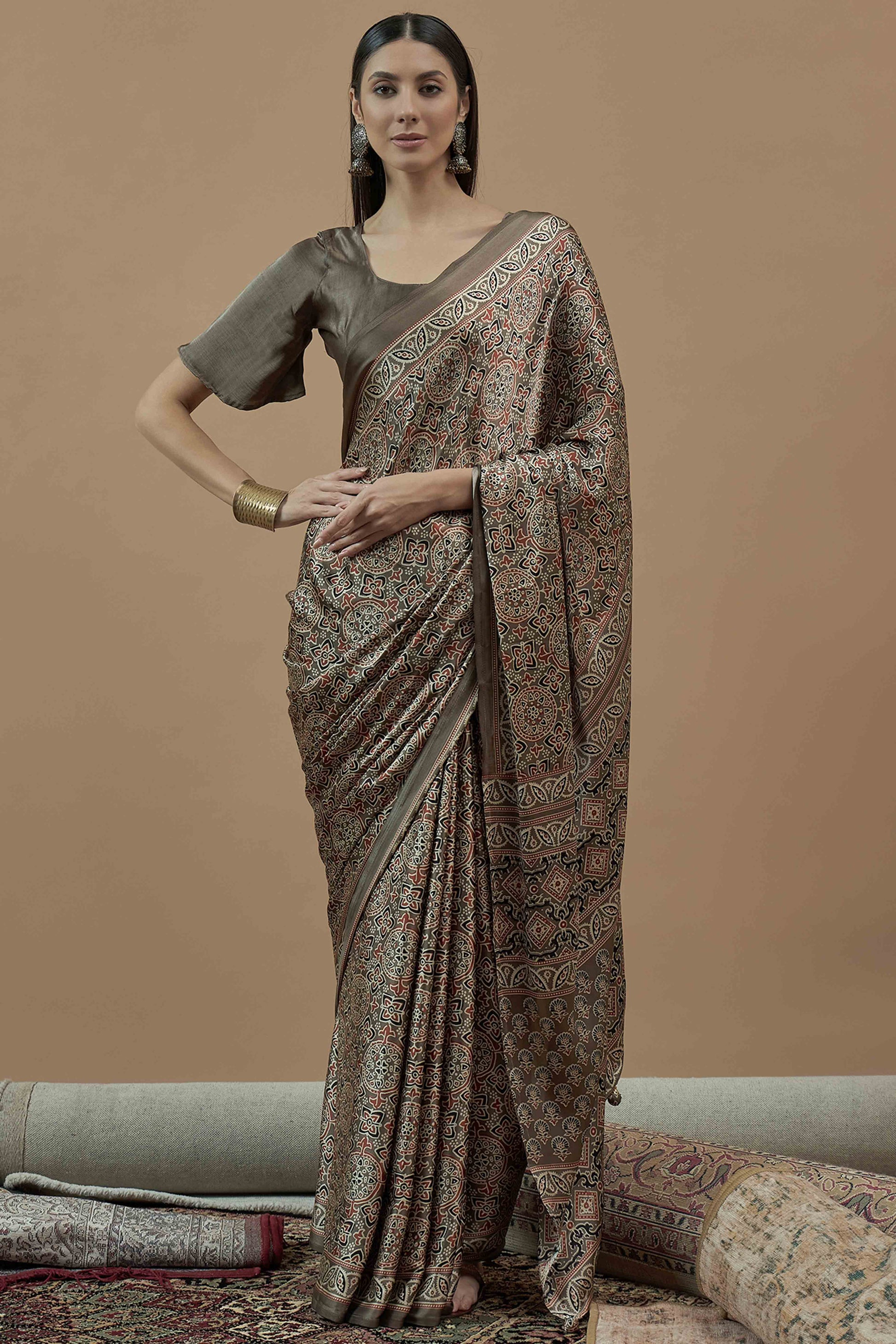 Brown Floral Ajrakh Printed Satin Saree With Tassels