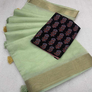 green-woven-solid-cotton-silk-saree-with-tassels