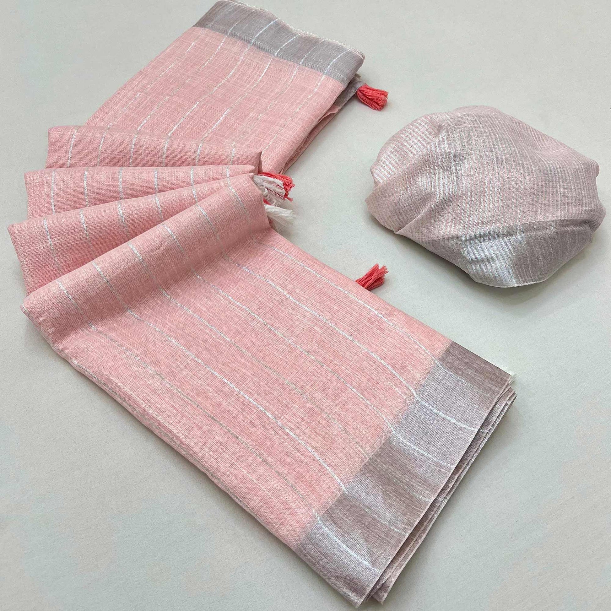 Light Pink Zari Woven Linen Saree With Tassels