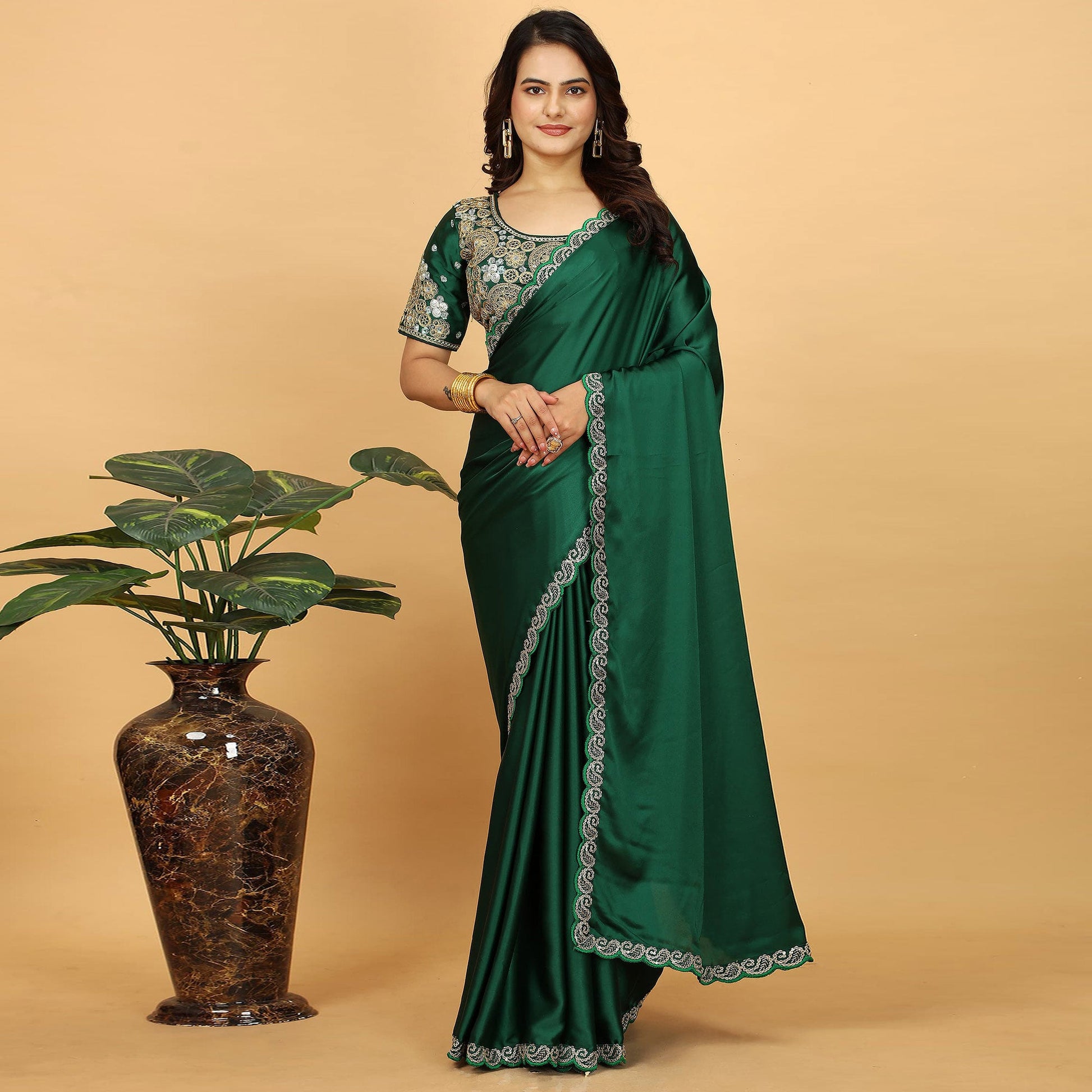 green-solid-satin-saree-with-sequins-embroidered-border