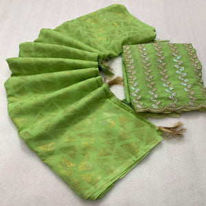 green-geometric-foil-printed-georgette-saree-with-tassels