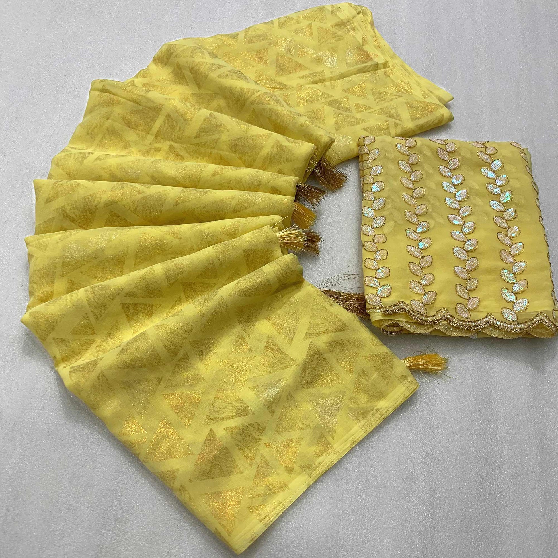 Lemon Yellow Geometric Foil Printed Georgette Saree With Tassels