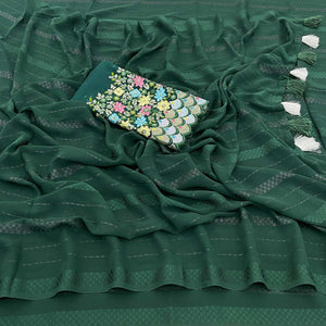 green-woven-georgette-saree-with-tassels-1