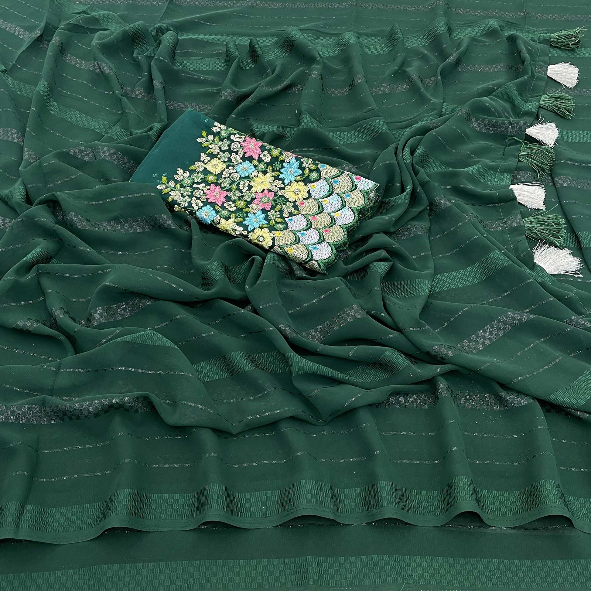 green-woven-georgette-saree-with-tassels-1