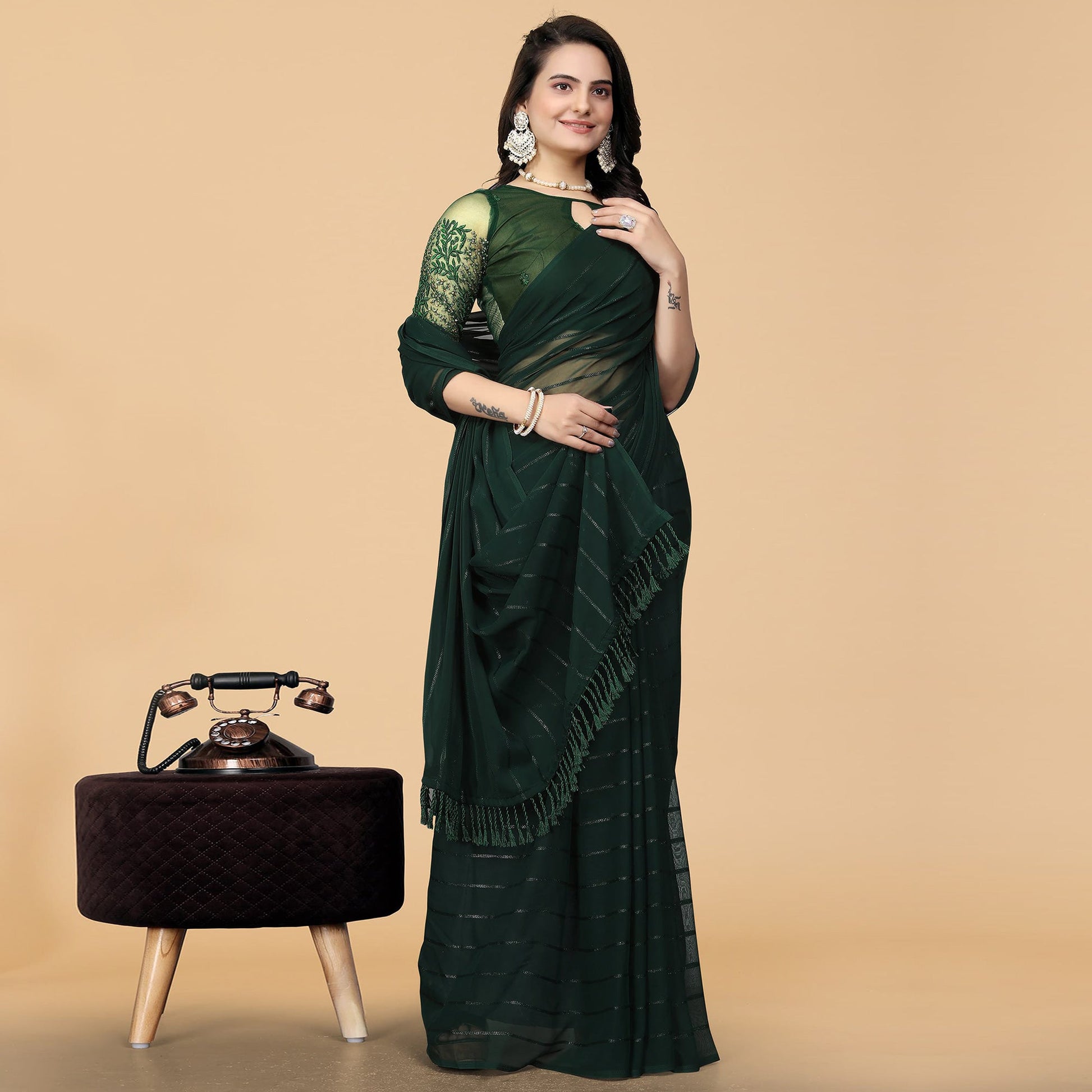 green-striped-georgette-saree-with-tassels