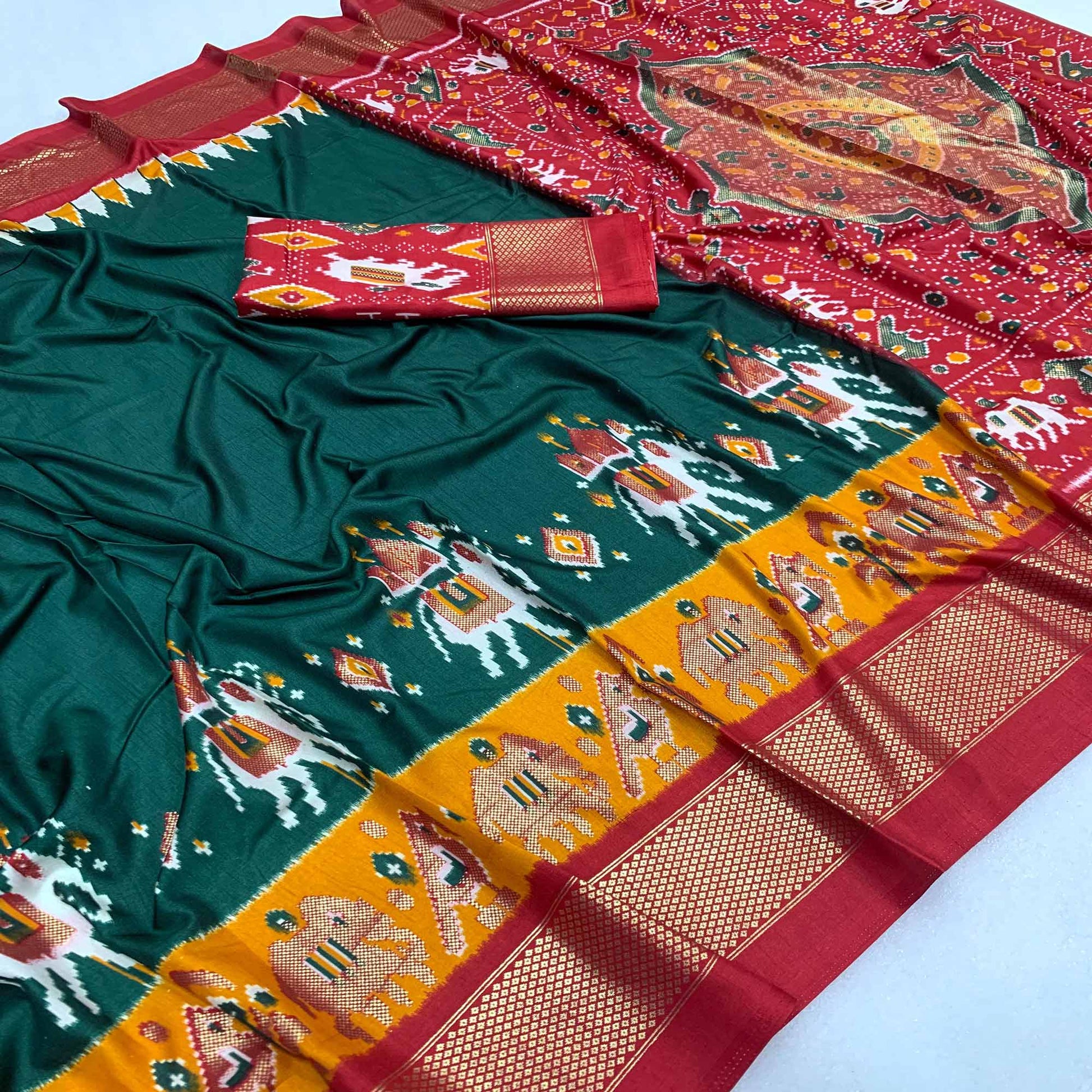 green-ikkat-printed-dola-silk-saree-with-patola-print
