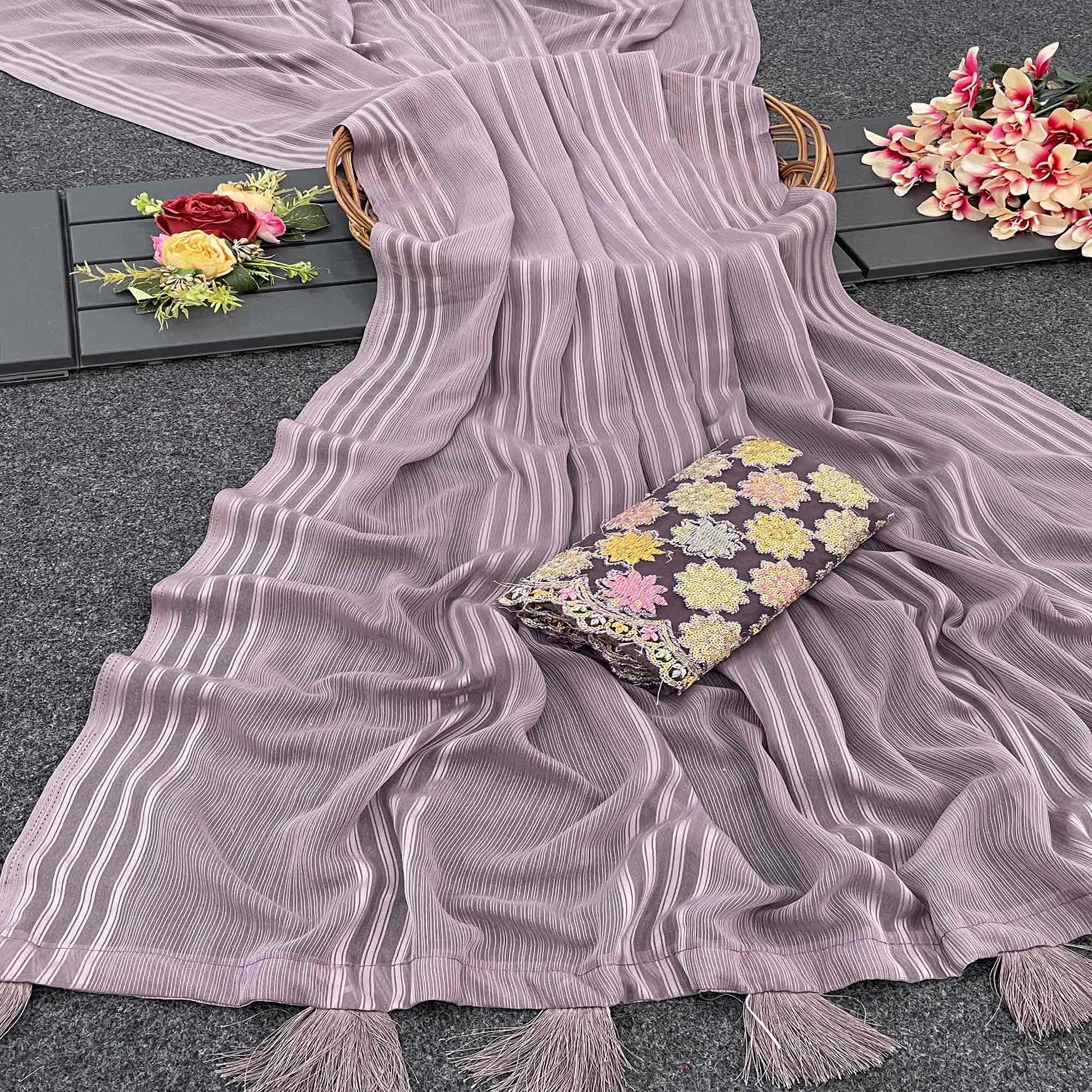Mauve Zari Striped Woven Georgette Saree