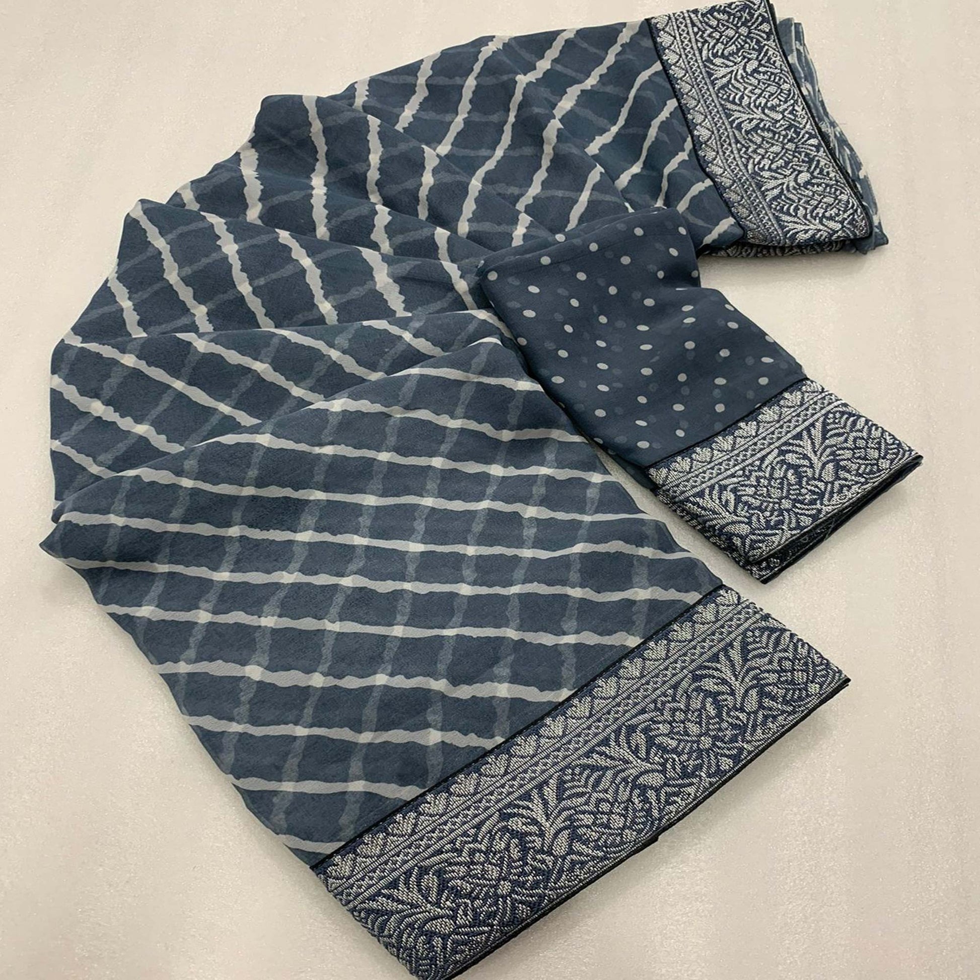 grey-leheriya-printed-georgette-saree-with-woven-border