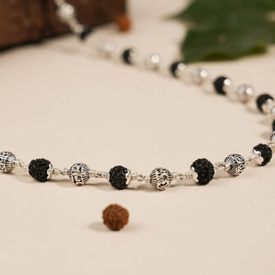 BLACK RUDRAKSHA WITH OM NAMAH SHIVAY SILVER BEADS MALA