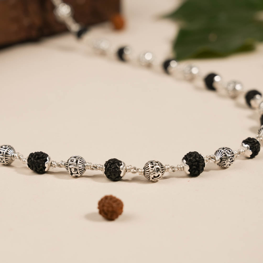 BLACK RUDRAKSHA WITH OM NAMAH SHIVAY SILVER BEADS MALA