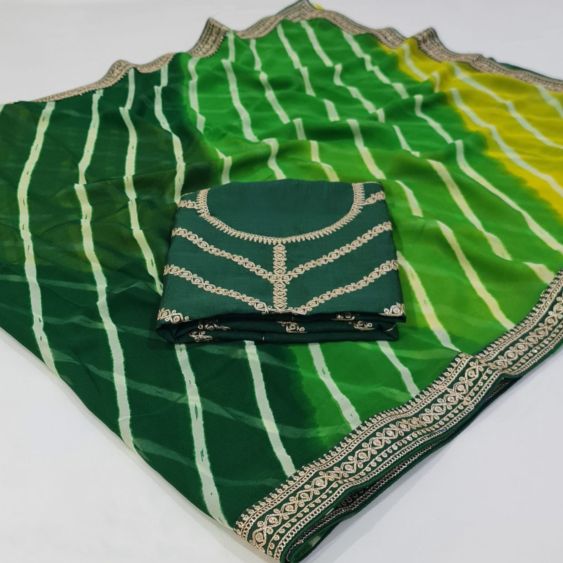 green-printed-georgette-saree-with-lace-border