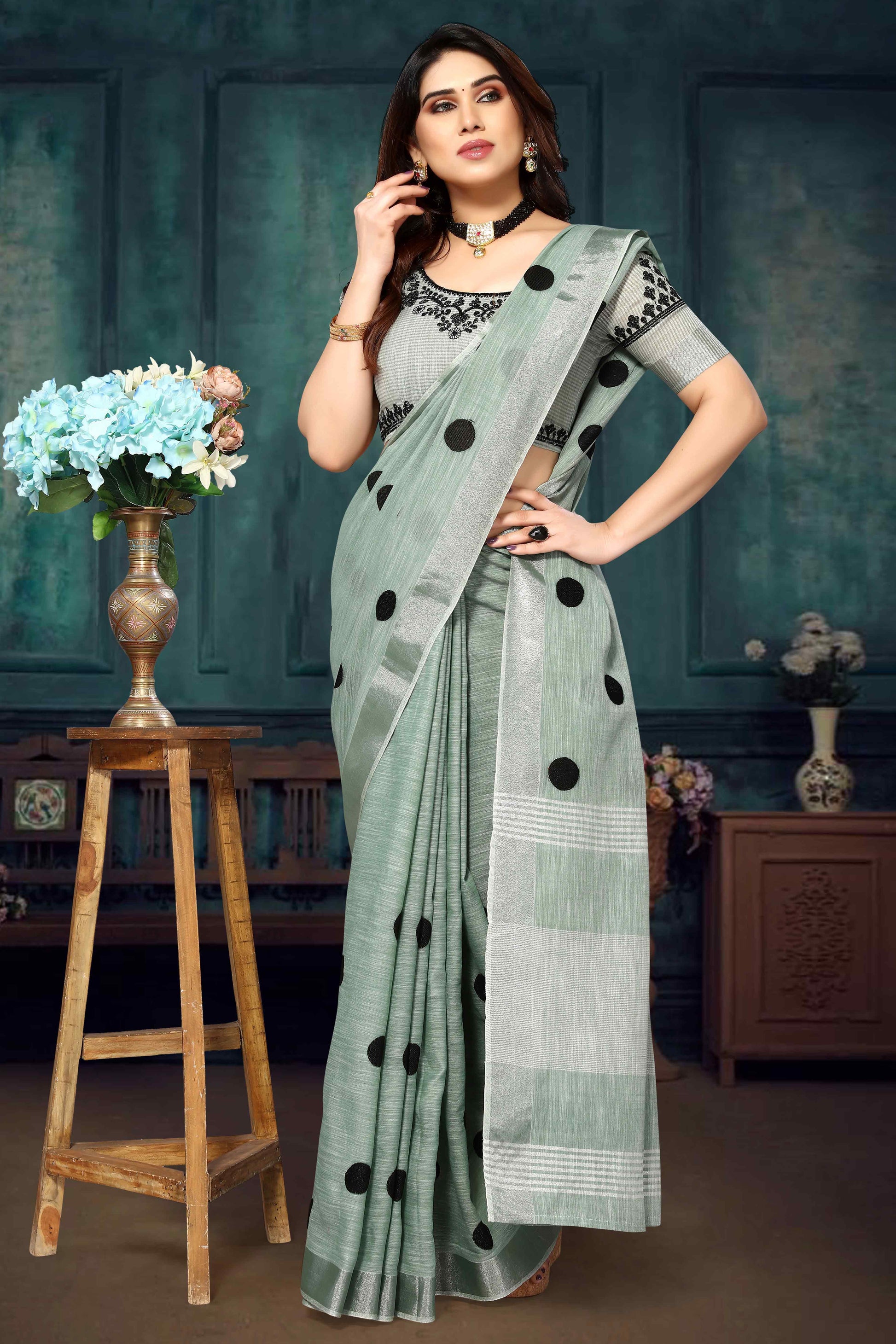 green-embroidered-linen-cotton-saree-with-zari-border