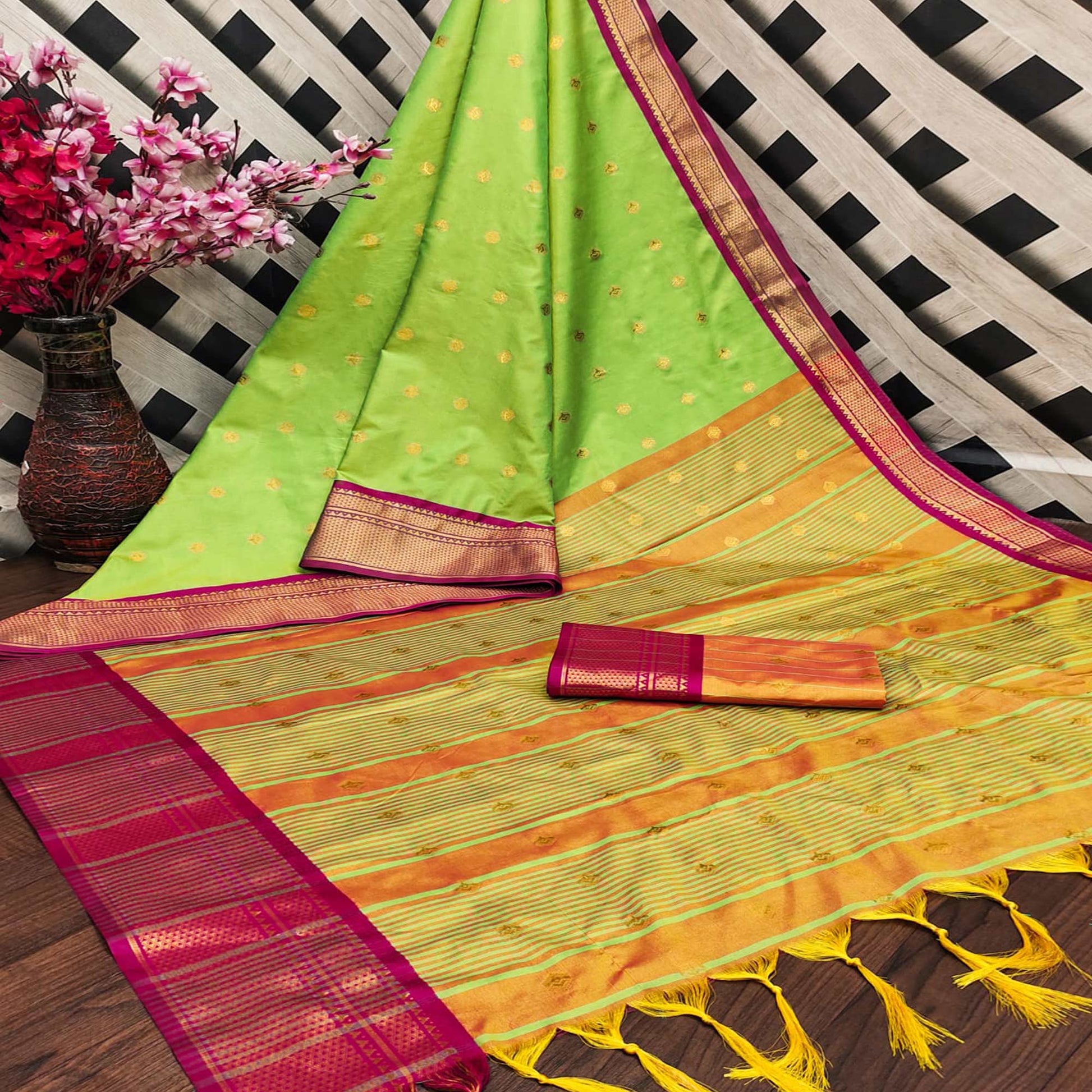 green-zari-woven-lichi-art-silk-saree-with-tassels