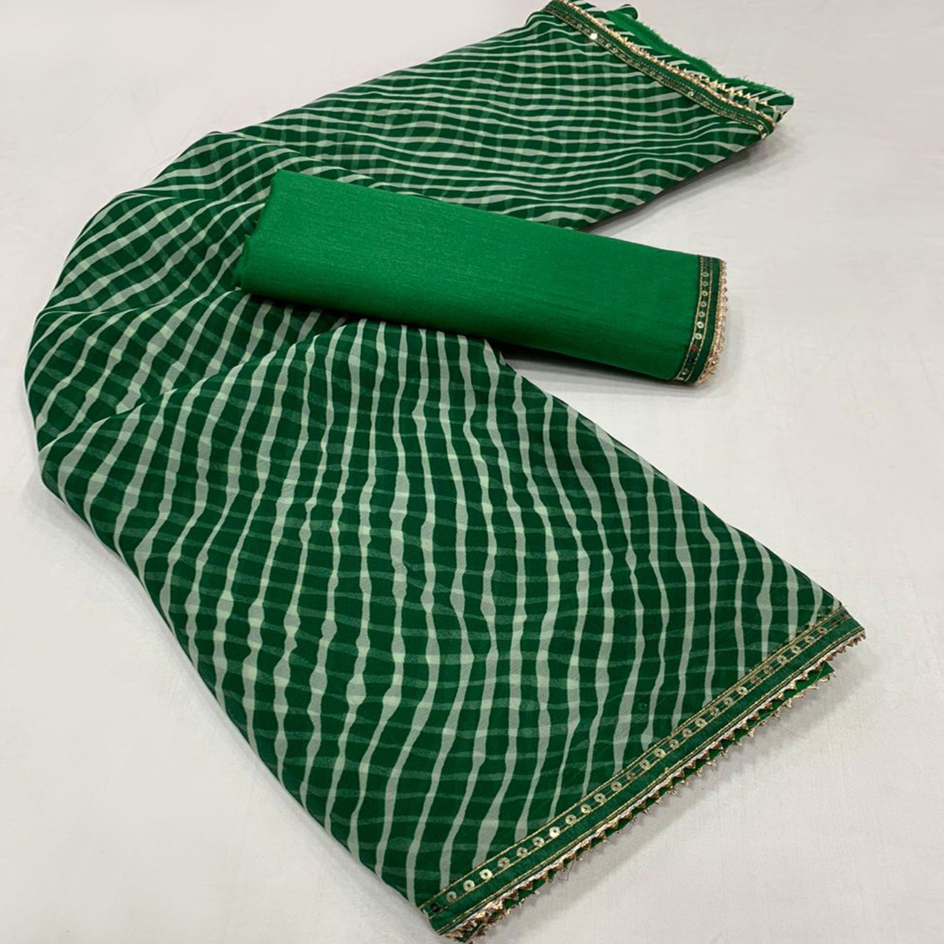 green-white-printed-georgette-saree-with-sequins-border