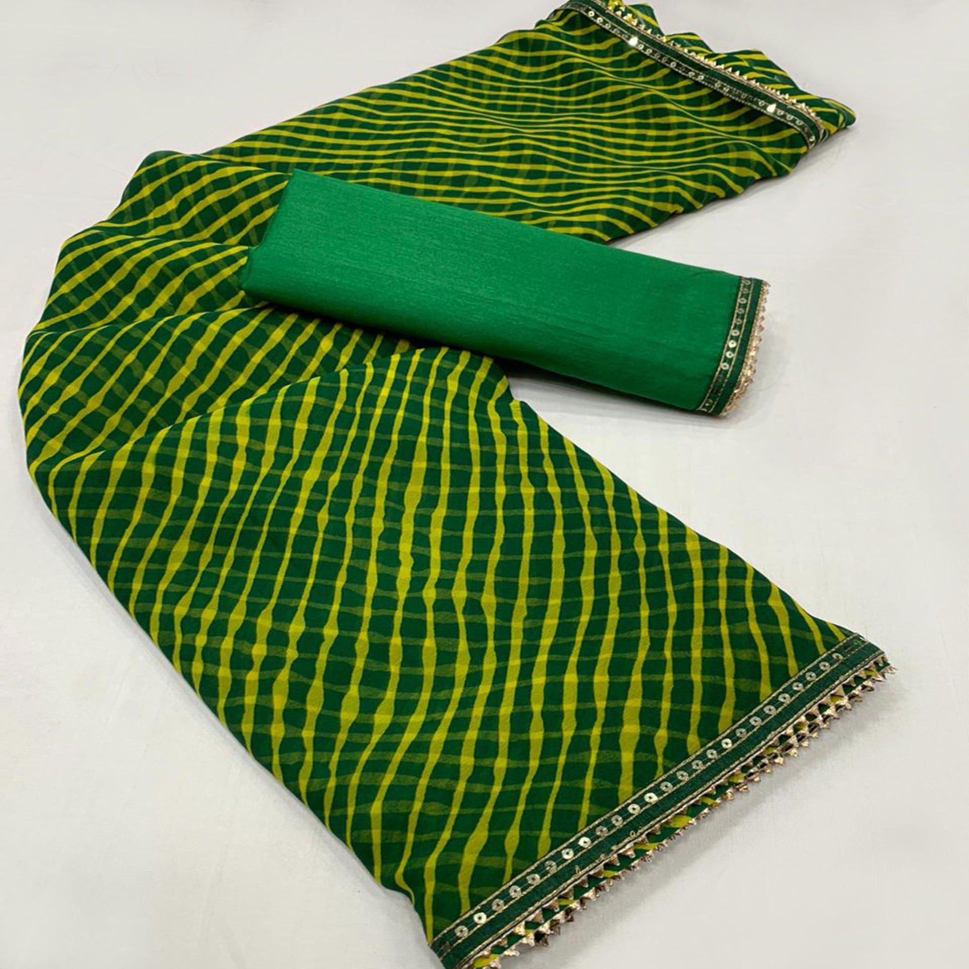 green-yellow-printed-georgette-saree-with-sequins-border