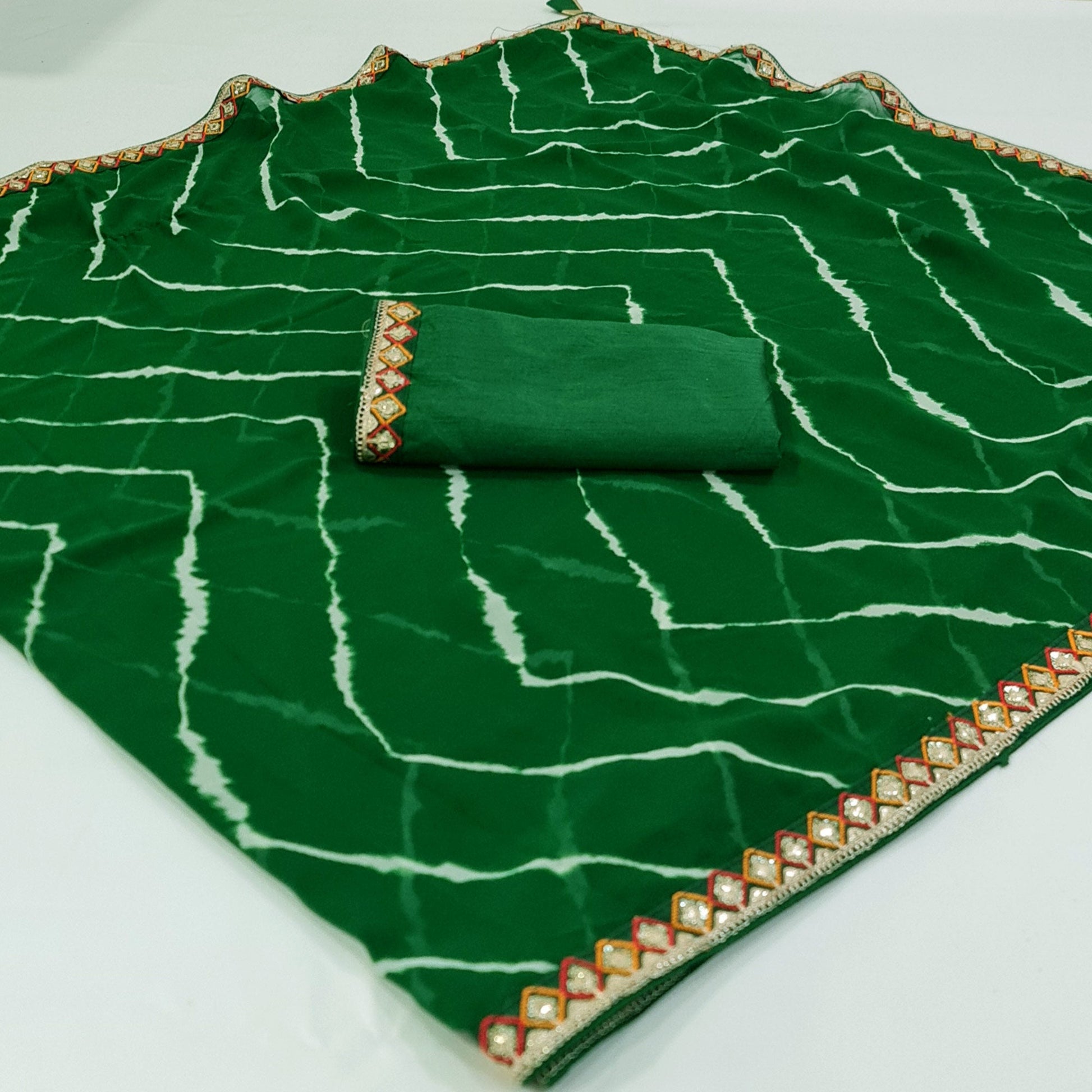 green-printed-georgette-saree-with-sequins-border