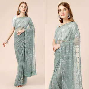 green-tikki-wor-lycra-saree-with-embroidered-border