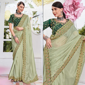 green-solid-with-embroidered-border-organza-saree