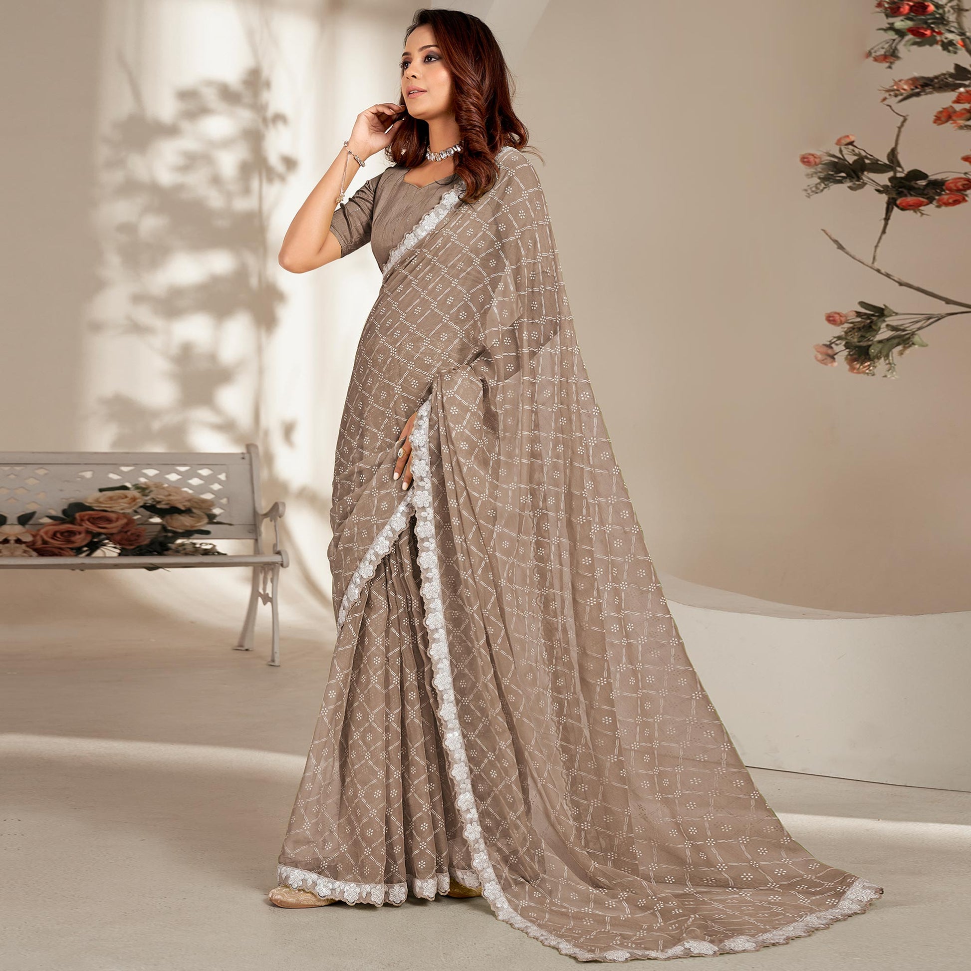 Brown Floral Printed Chiffon Saree With Embroidered Border