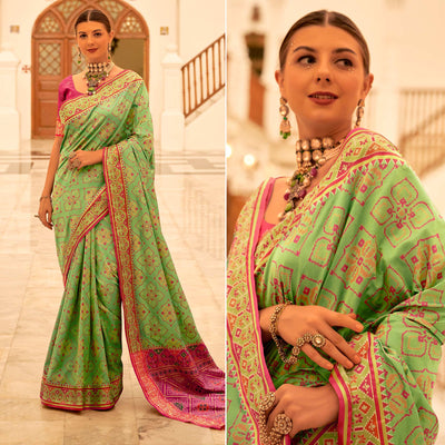 green-patola-printed-banarasi-silk-saree-with-tassels